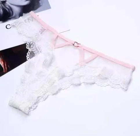 Elegant low waist thong panties in a rich solid colour, made from high-quality polyester and lace, perfect for women seeking both style and comfort.