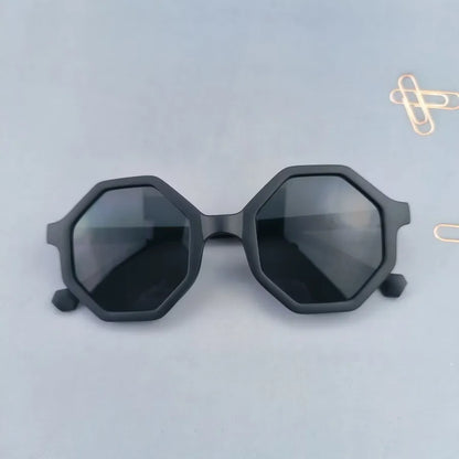 Premium quality tinted lens sunglasses for kids, showcasing a full-frame polygon structure, combining fashion and function.