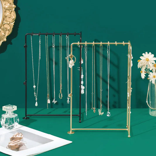 Elegant solid color iron jewelry display stand showcasing simple yet luxurious style for organizing accessories.