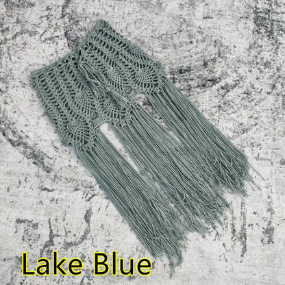 Elegant knee-length sundress for women in vibrant multicolor, designed for a luxurious vacation look with tasteful tassels and braids.