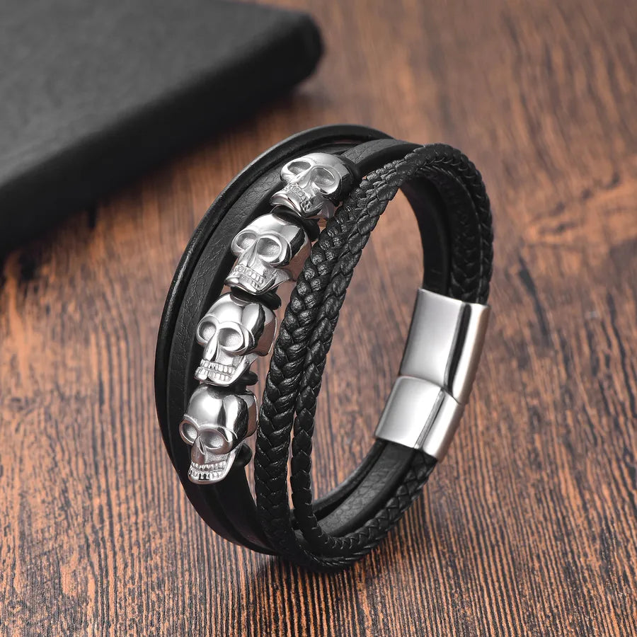 Stylish men's skull bracelet in a chic hip-hop design, exquisitely fashioned from stainless steel and leather, tailored for elegant Halloween festivity.