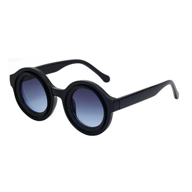 Luxury streetwear women's sunglasses featuring a full frame round geometric design in a chic grey and black colour scheme, perfect for all seasons.