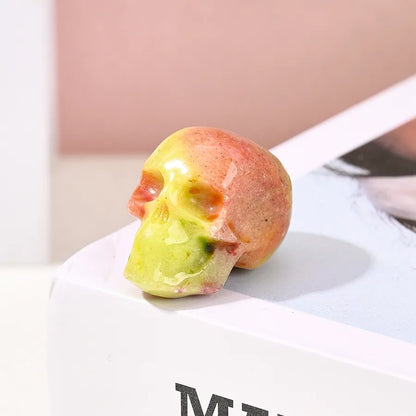 Artistic natural stone skull ornament in elegant sky blue and purple, perfect for enhancing the aesthetic of family gatherings and stylish tea parties.