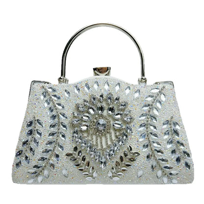 Close-up of the diamond-studded embellishments on a luxurious women's evening handbag, emphasising quality and sophisticated style.