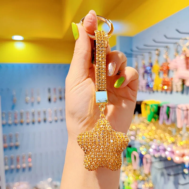 Charming keychain adorned with a glistening star design and fashion-forward tassel, suitable for both men and women.
