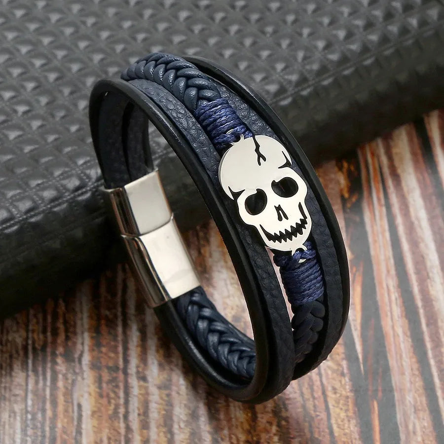 Chic and edgy skull pattern on a woven chain bracelet, crafted from high-quality stainless steel and leather, suitable for Halloween.