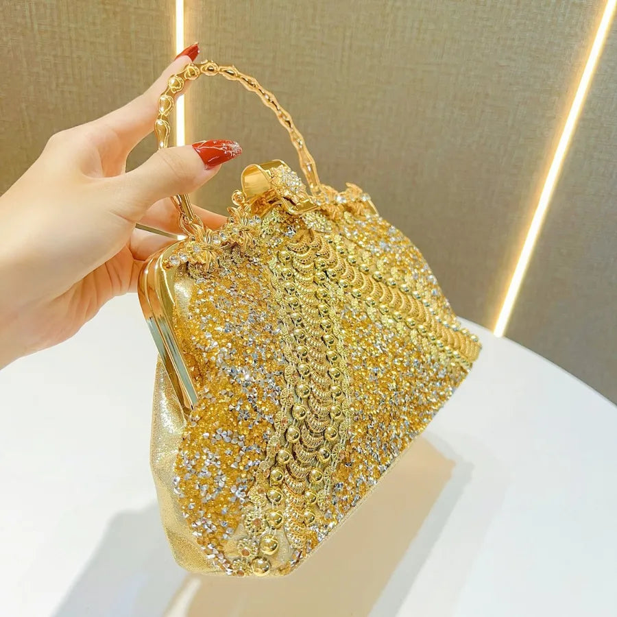 Close-up view of the luxurious diamond embedded clutch evening bag, highlighting its sophisticated PVC material and stylish pillow shape.