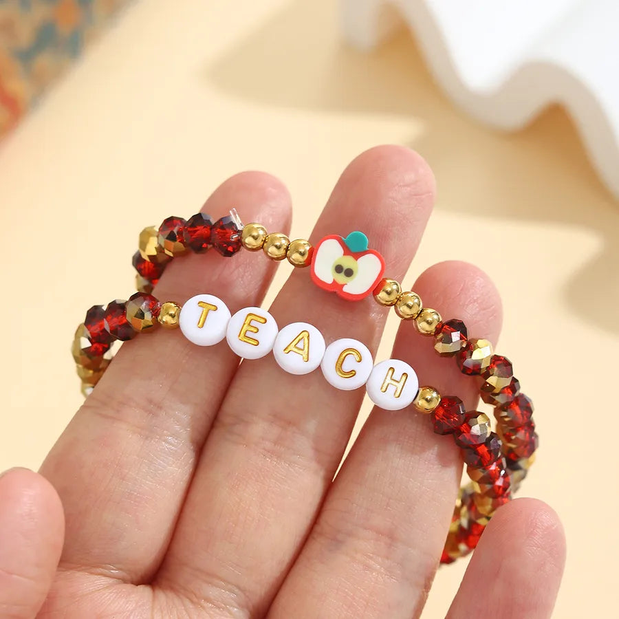 Display of the dual bracelets featuring an enchanting combination of colours and patterns, showcasing their preppy style.