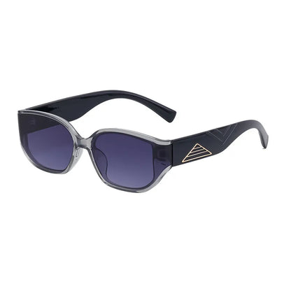 Elegant full-frame sunglasses featuring a geometric pattern in grey and black, ideal for fashion-forward women on the go.