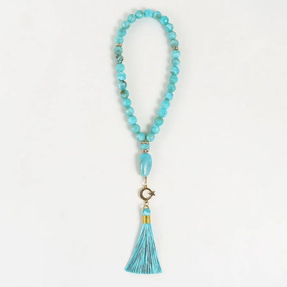 Opulent unisex tassel rosary in classical ethnic style, highlighting a harmonious blend of pink, blue, and black colours.