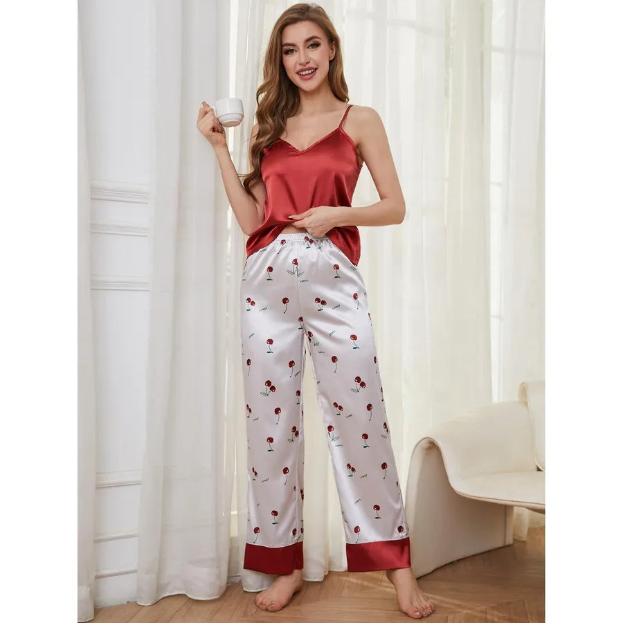Elegant women's two-piece summer slip skirt and satin pants set in ice silk fabric, perfect for luxurious home and hotel lounging.