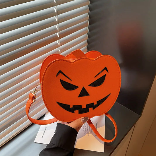 Stylish medium-sized Halloween pumpkin-shaped crossbody bag made of premium PU leather, featuring a secure zipper closure, multicolor love heart details, and a comfortable shoulder strap - perfect for festive occasions and everyday elegance.