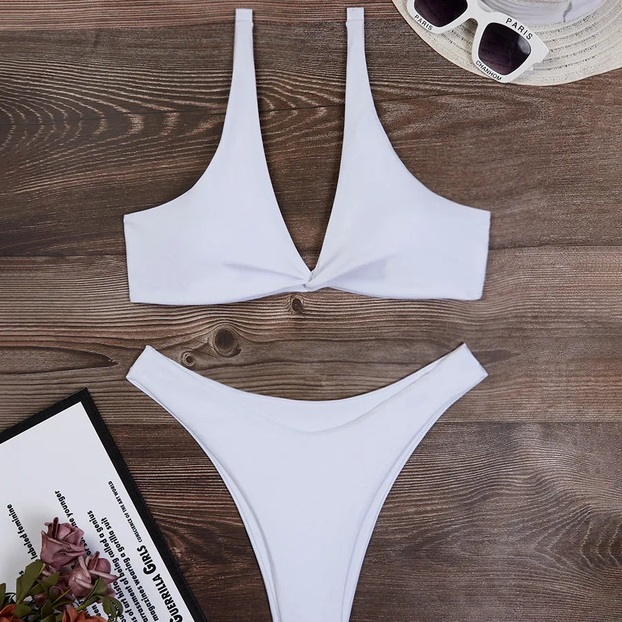 Luxury women's solid colour 2-piece bikini set featuring a sexy low waist design and triangle cup swimwear, perfect for beach and pool outings.