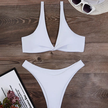 Luxury women's solid colour 2-piece bikini set featuring a sexy low waist design and triangle cup swimwear, perfect for beach and pool outings.