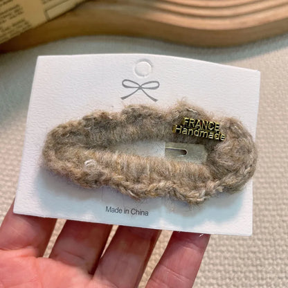 Chic and luxurious lamb fur headwear accessory for women, enhancing any fashionable look effortlessly.