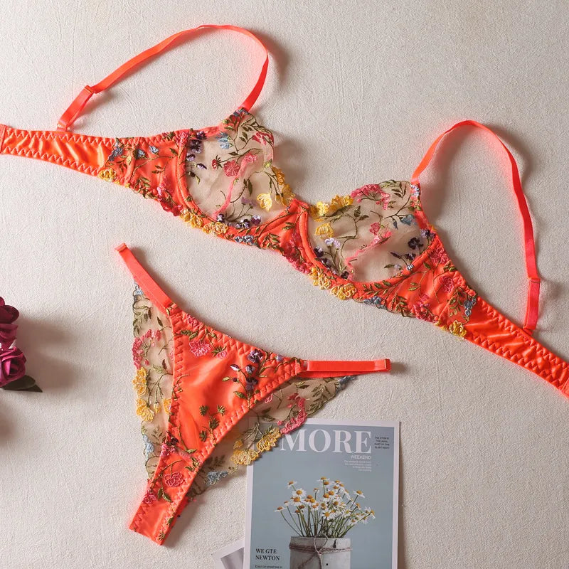 Luxurious women's sexy floral embroidered lingerie set featuring an underwire bra and a low waist thong, designed for elegance and sensuality.