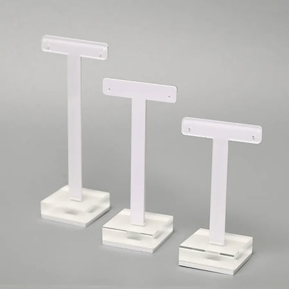 Elegant T-Shape Organic Glass Jewelry Display Stand designed for showcasing minimalist earrings, perfect for luxurious storage solutions.
