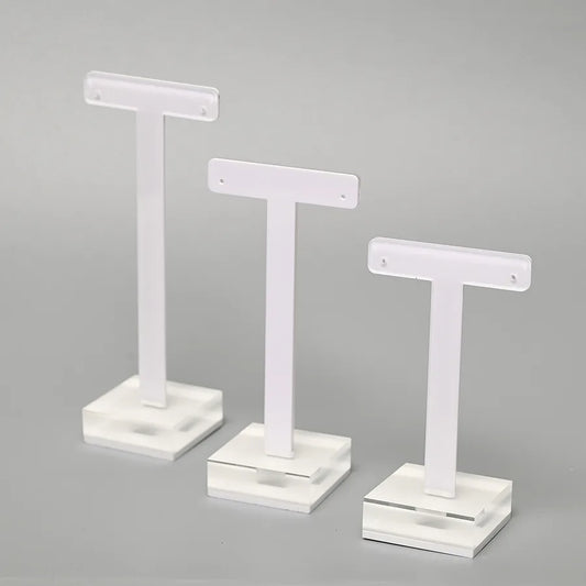 Elegant T-Shape Organic Glass Jewelry Display Stand designed for showcasing minimalist earrings, perfect for luxurious storage solutions.