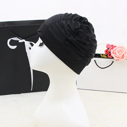 Elegant solid colour nylon swimming cap for adults, showcasing a sleek design and premium material, ideal for fashionable aquatic adventures.