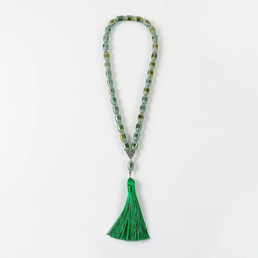 Beautifully arranged classical rosary with elegant tassels, representing the perfect gift for special events and spiritual moments.