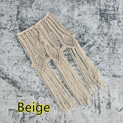 Sophisticated solid colour vacation cover up for women, showcasing beautiful tassel detailing and a stylish braid design for a glamorous summer look.