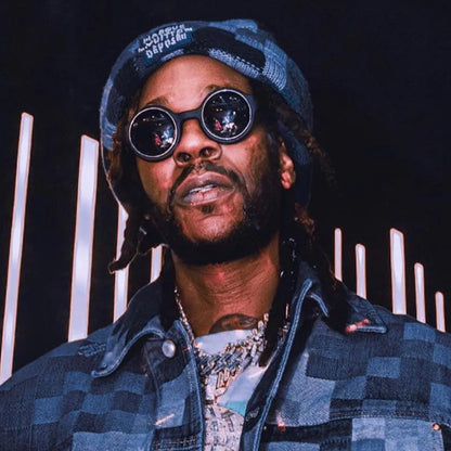 Luxury women's sunglasses featuring a full frame round geometric design in elegant grey and black, perfect for all seasons and outdoor travel.