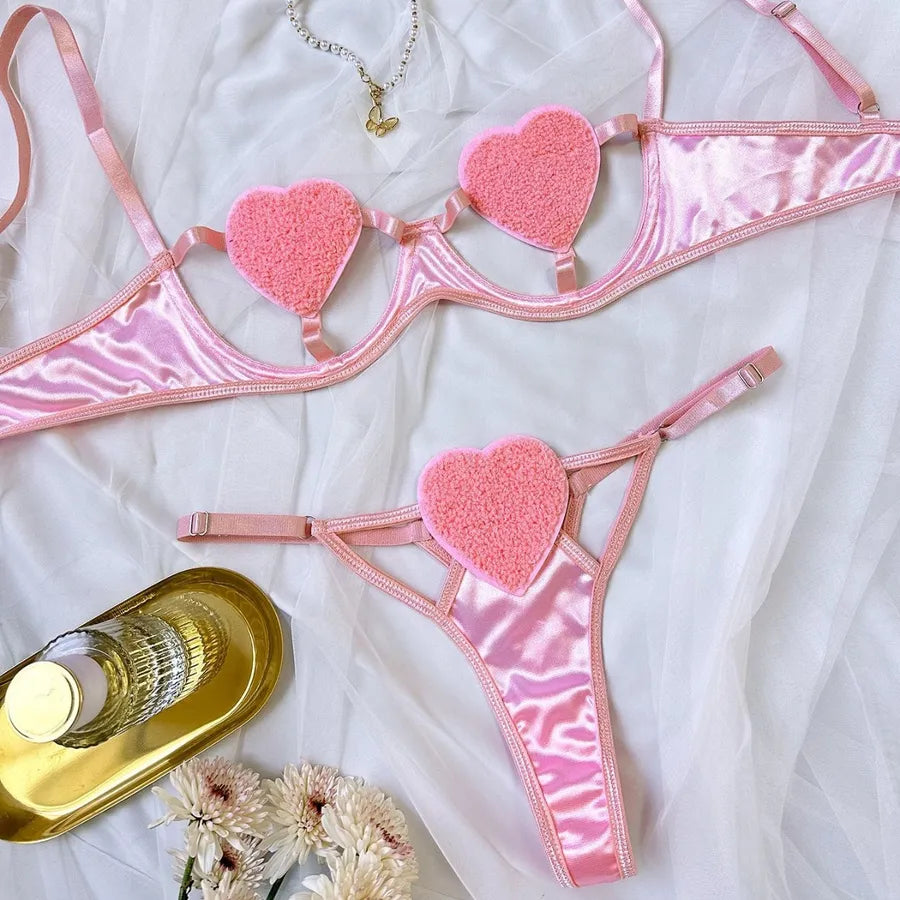 Luxurious women's sexy heart-shaped lingerie set featuring a stunning two-piece bra and thong designed for honeymoons and all seasons.