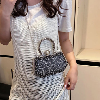 Elegant display of the luxurious retro square box evening bag featuring a single shoulder strap, designed with exquisite diamond accents for a glamorous touch.