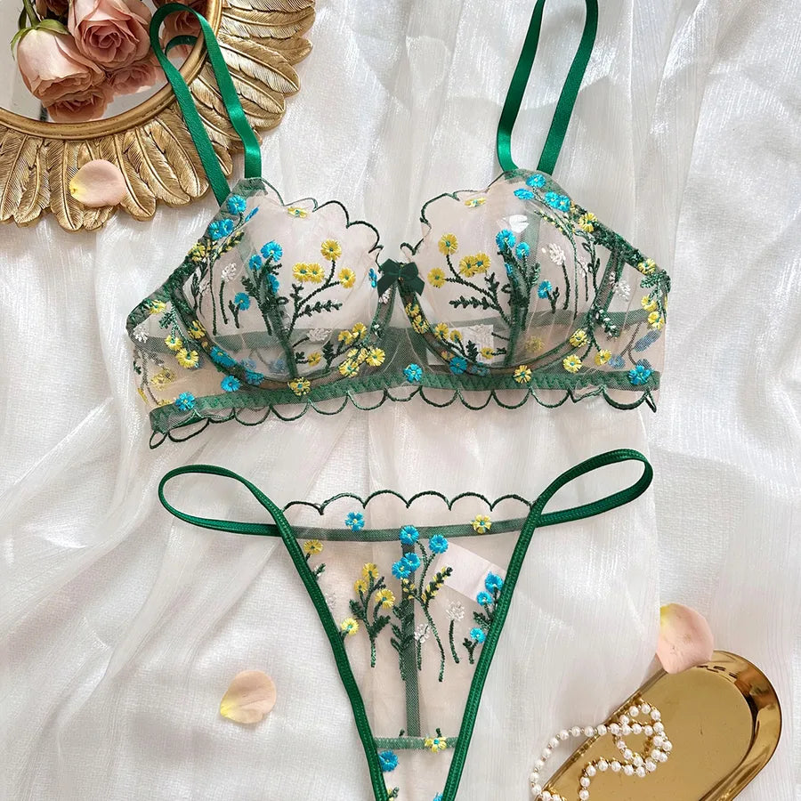 Elegant women's sexy floral lingerie set featuring a sheer bra and low waist thong, perfect for romantic occasions.