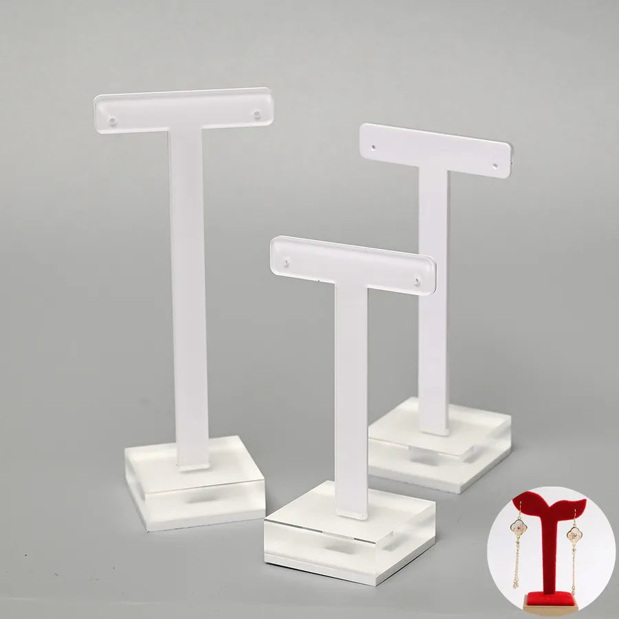 Luxurious T-Shape Organic Glass Jewelry Display Stand Set, handmade minimalist earring holder, showcasing its elegant design and craftsmanship.