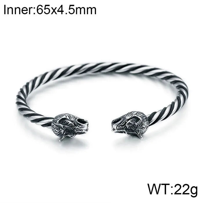 Stylish depiction of a skull-themed Men's bangle bracelet in high-quality stainless steel, ideal for rock and punk fashion enthusiasts.