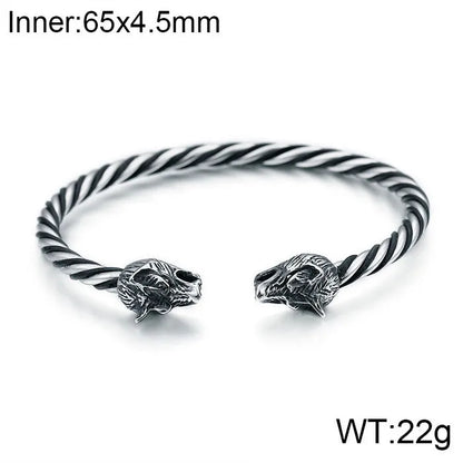 Stylish depiction of a skull-themed Men's bangle bracelet in high-quality stainless steel, ideal for rock and punk fashion enthusiasts.