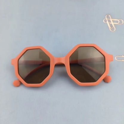 Cute modern design of unisex children's sunglasses showcasing a trendy geometric pattern, ideal for all seasons.