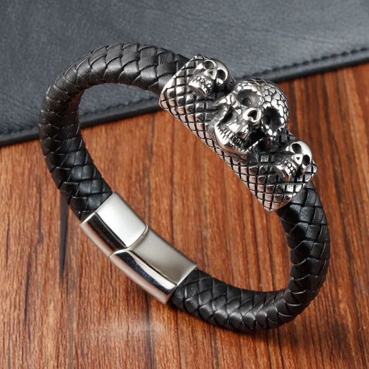 Close-up of a men's retro skull bracelet crafted with premium pu leather and titanium steel, showcasing intricate woven design.