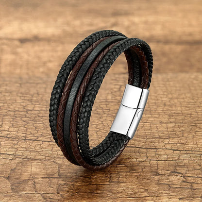 Lifestyle image of a man wearing a men's vintage punk geometric wristband, elegantly styled with casual and edgy outfits, demonstrating versatility.