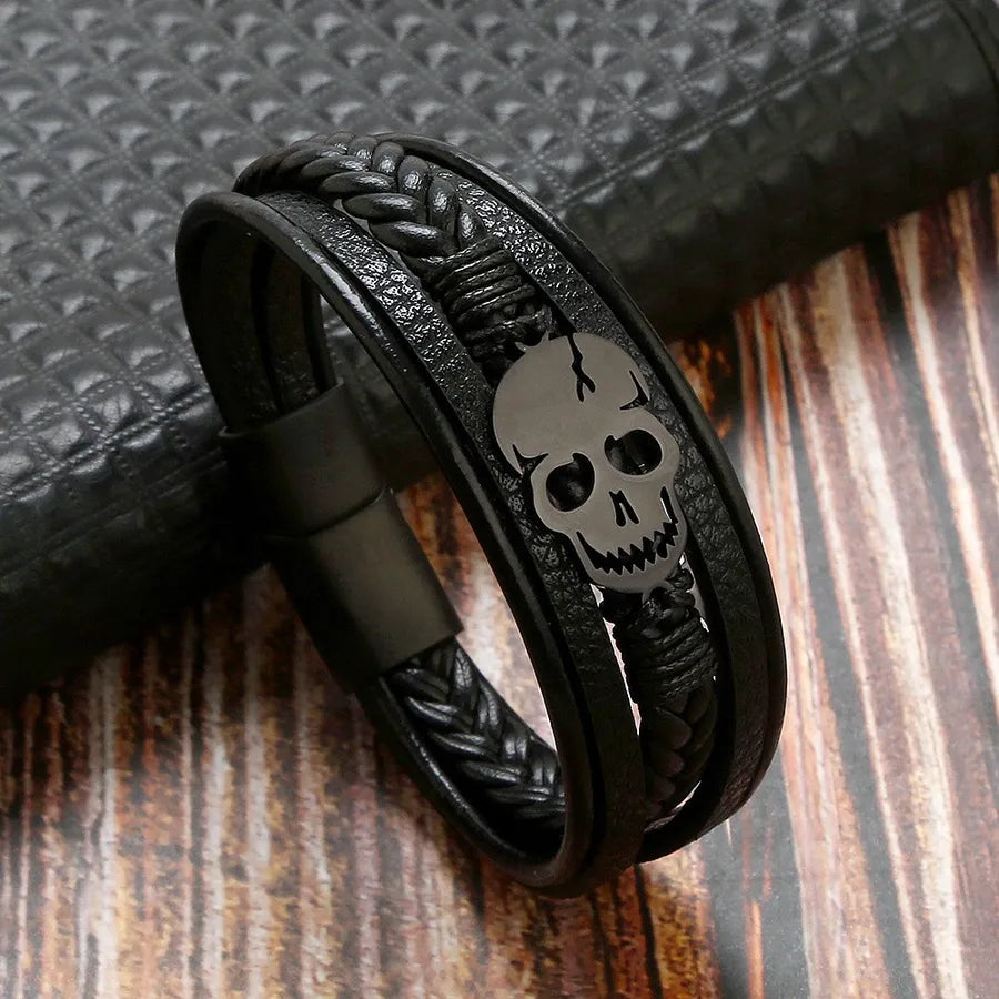 Intricately braided design of the Punk Skull Bracelet for men, showcasing durable 304 Stainless Steel and luxurious PU Leather.