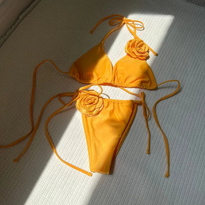 Chic women's two-piece bikini, crafted from soft polyester, designed with a sexy low waist for a flattering fit at the beach.