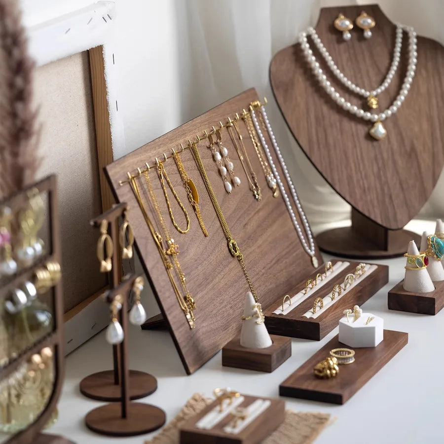 Stylish walnut veneer jewelry display stand highlighting earrings and necklaces with an advanced sense of style, ideal for luxury storage solutions.