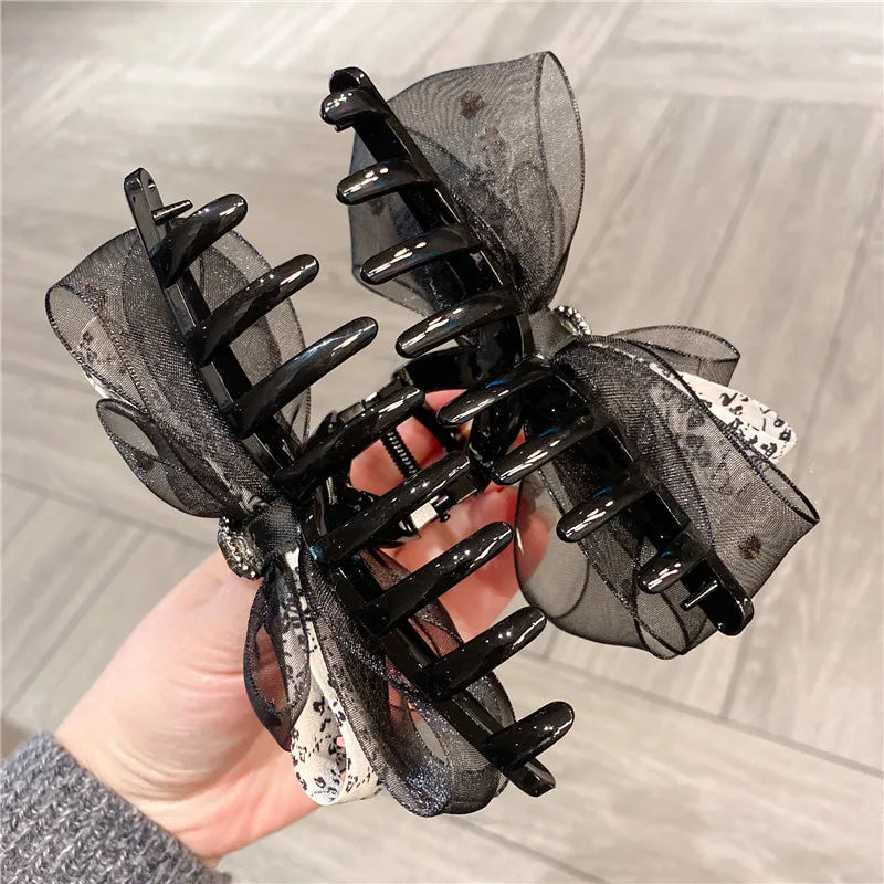 Premium women’s headwear featuring a sophisticated floral pattern and butterfly knot detail, ideal for a fashionable touch to your lavish style.