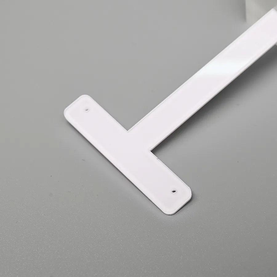 Handcrafted minimalist earring holder featuring organic glass material, ideal for adding a touch of sophistication to any jewellery display.