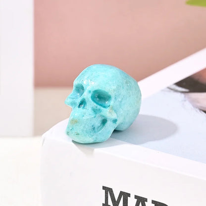 Luxurious handmade skull ornament, showcasing intricate patterns in sky blue and purple, ideal for adding a touch of refinement to Halloween decor.