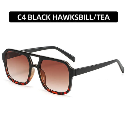 Fashionable women's sunglasses with a full frame and geometric pattern in stunning pink, designed for those seeking luxury in casual sportswear.