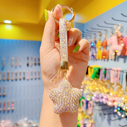 Charming and versatile Cartoon Star Keychain with tassel, a perfect blend of elegance and playfulness for discerning gift shoppers.