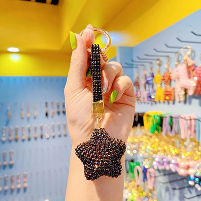 Chic star-shaped keychain with Czech diamond embellishments and a luxurious tassel, an exquisite gift choice for special celebrations like Christmas and Valentine's Day.