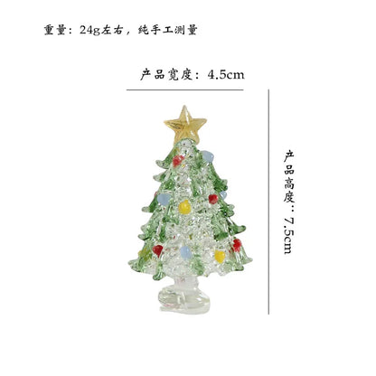Stylish frosted glass Christmas tree decoration displayed on a minimalist table, enhancing the elegance of any festive occasion.