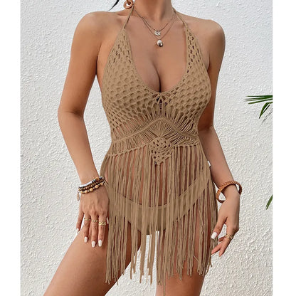 Model wearing an elegant Women's Mesh Cover Up with halter neck and tassel accents, epitomising luxurious summer attire.