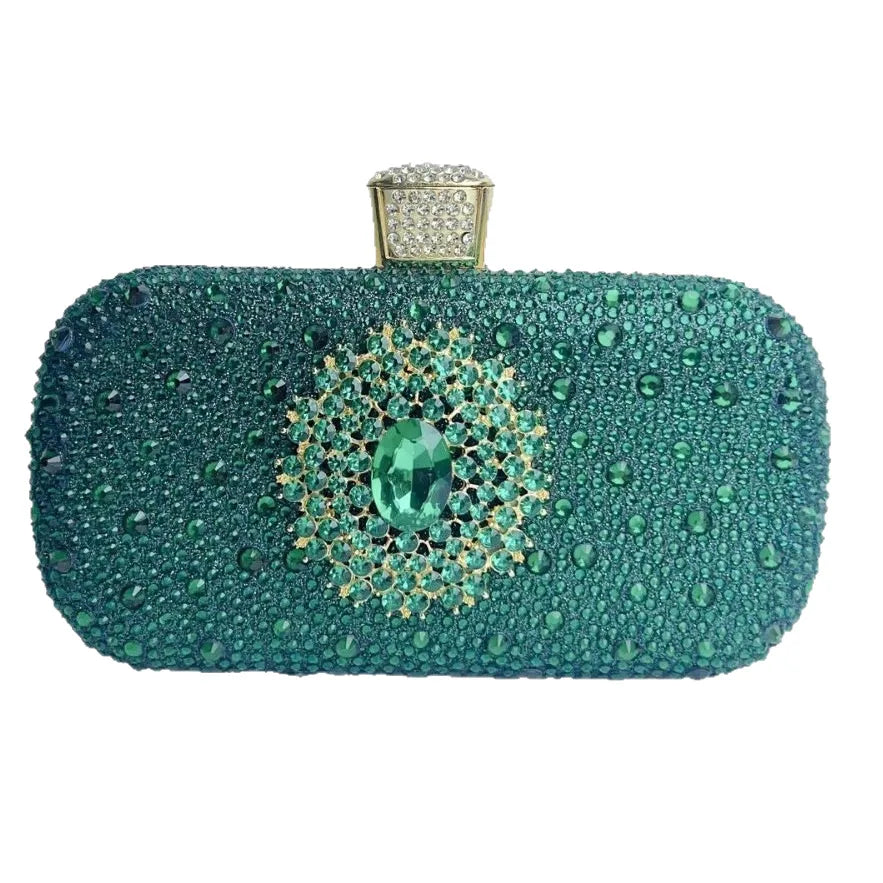 Functional evening bag with a removable chain handle, allowing for versatile styling as a clutch or shoulder bag.