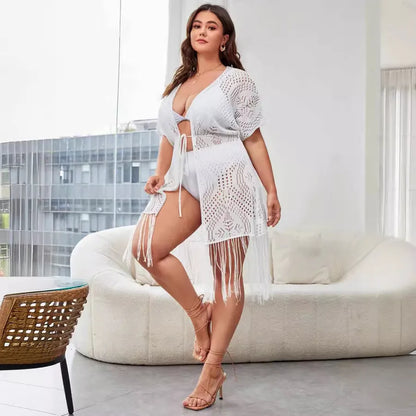 Elegant women's sexy mesh beach cover-up cardigan in a long, loose fit featuring stylish tassel details, perfect for summer beach outings.