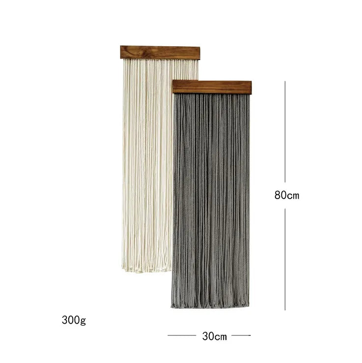 Chic interior setting featuring the Nordic style retro cotton rope wall hanging tapestry, adorned with tassels and exhibiting a contemporary lattice pattern that enhances luxury home aesthetics.