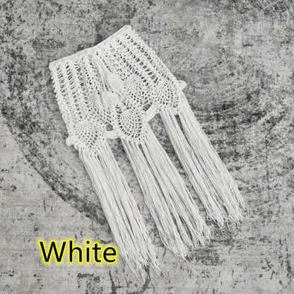 Luxurious women's sundress in solid multicolor design, adorned with intricately braided details, perfect for stylish beach outings.